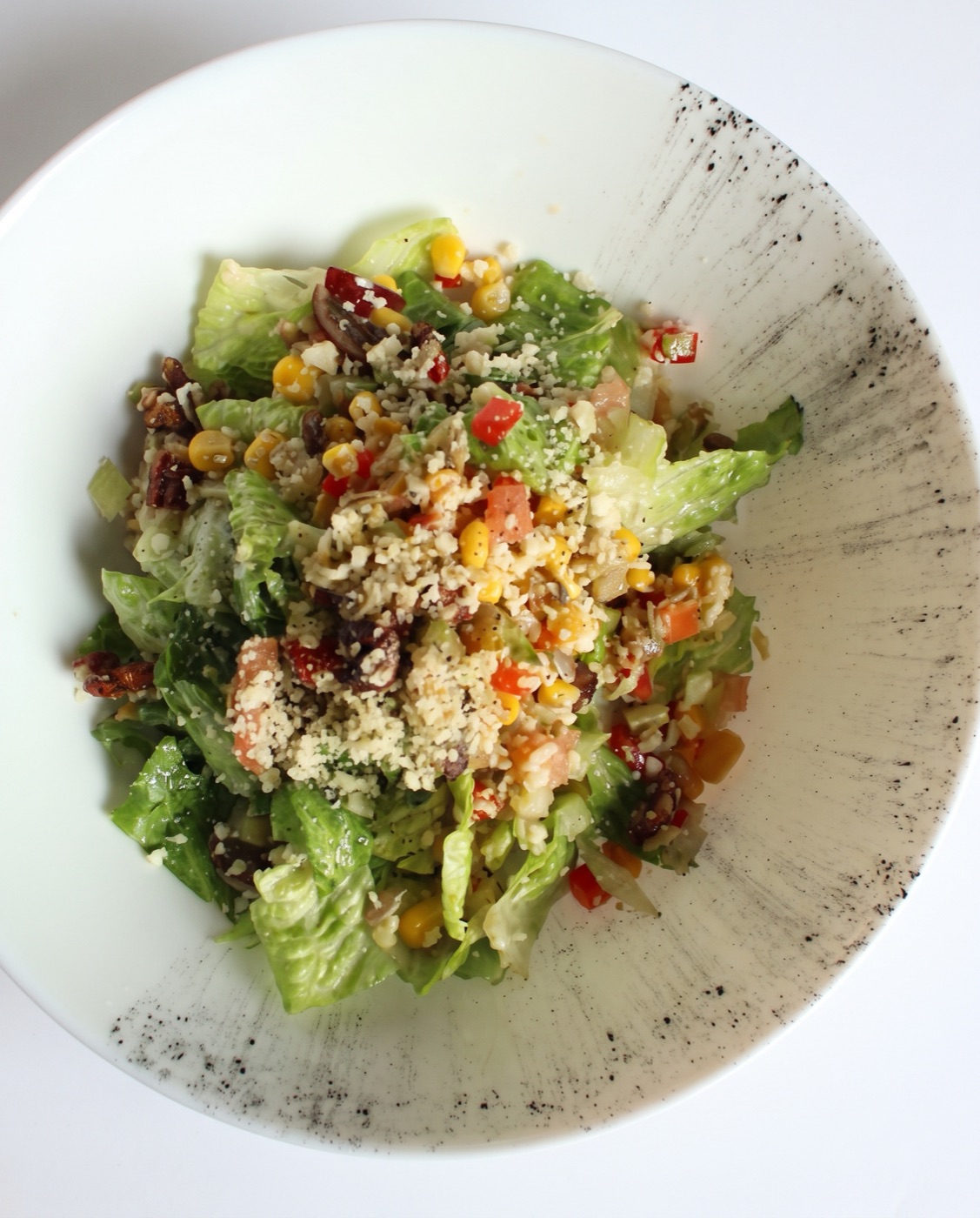 House salad with corn, pecans, quinoa and parmigiano